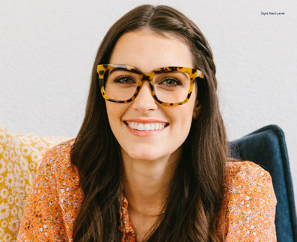 Brunette woman wearing Next Level