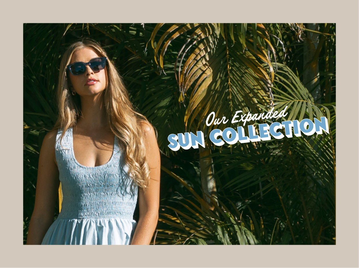 girl in blue sunnies outside "Our expanded sunnies collection"