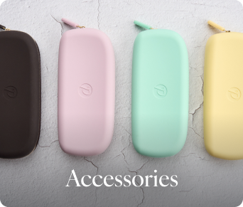Four colorful eyewear cases on a textured surface with 'Accessories' text.