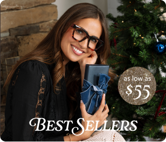 Woman holding a blue gift box with a Christmas tree in the background and text overlay.