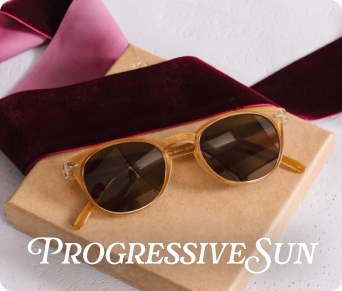 Sunglasses on a wooden stand with 'PROGRESSIVE SUN' text