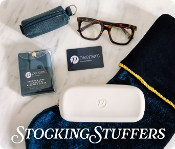 Glasses, cleaning cloth, and other items on a white surface with 'peepers' branding.