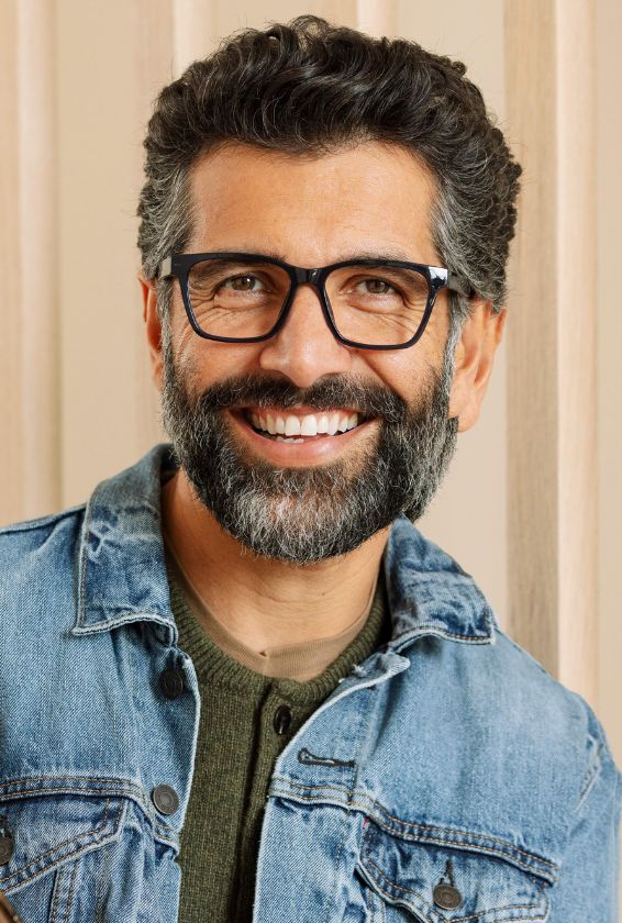 Man wearing amber navy reading glasses