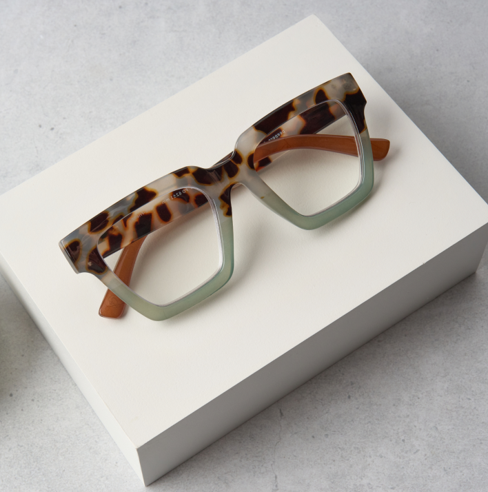 Green Tortoise Take a Bow flat lay