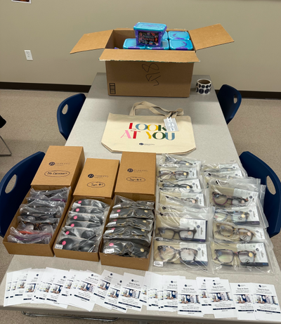 Peepers eyewear and supplies organized for school donation day