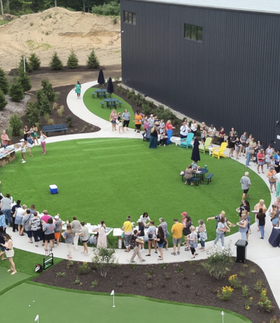 Aerial view of a Peepers community event with families and teachers