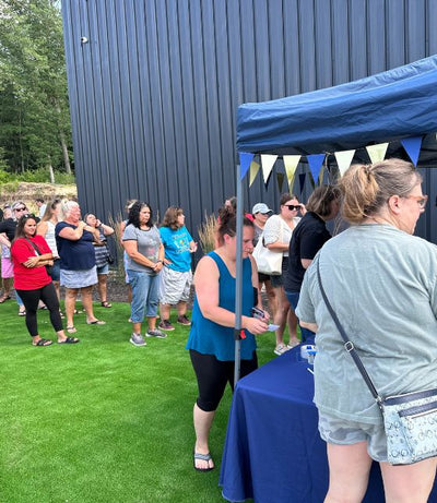 Peepers team selfie wearing Peepers for Teachers t-shirts outdoors