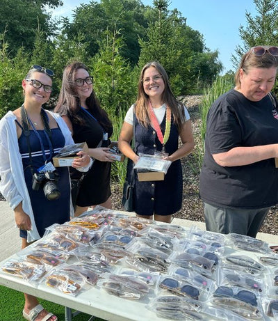 Peepers team wearing matching shirts at a teacher appreciation event