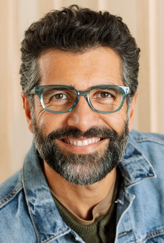 man wearing blue Clive reading glasses