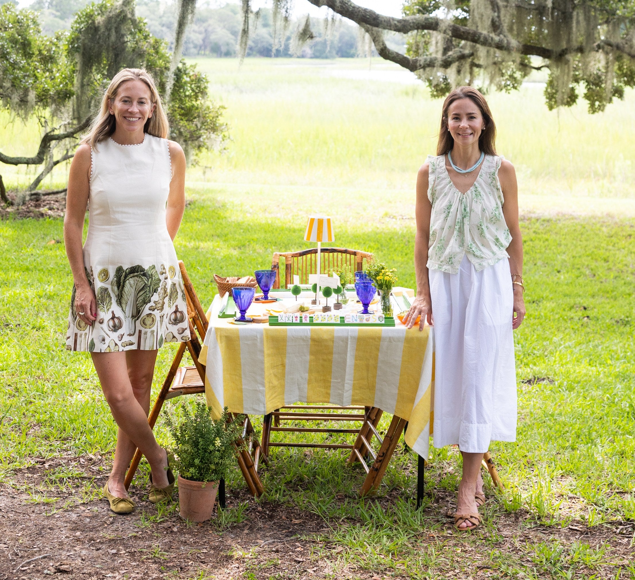 Anne and Caroline of Holy Mahj at a styled mahjong table