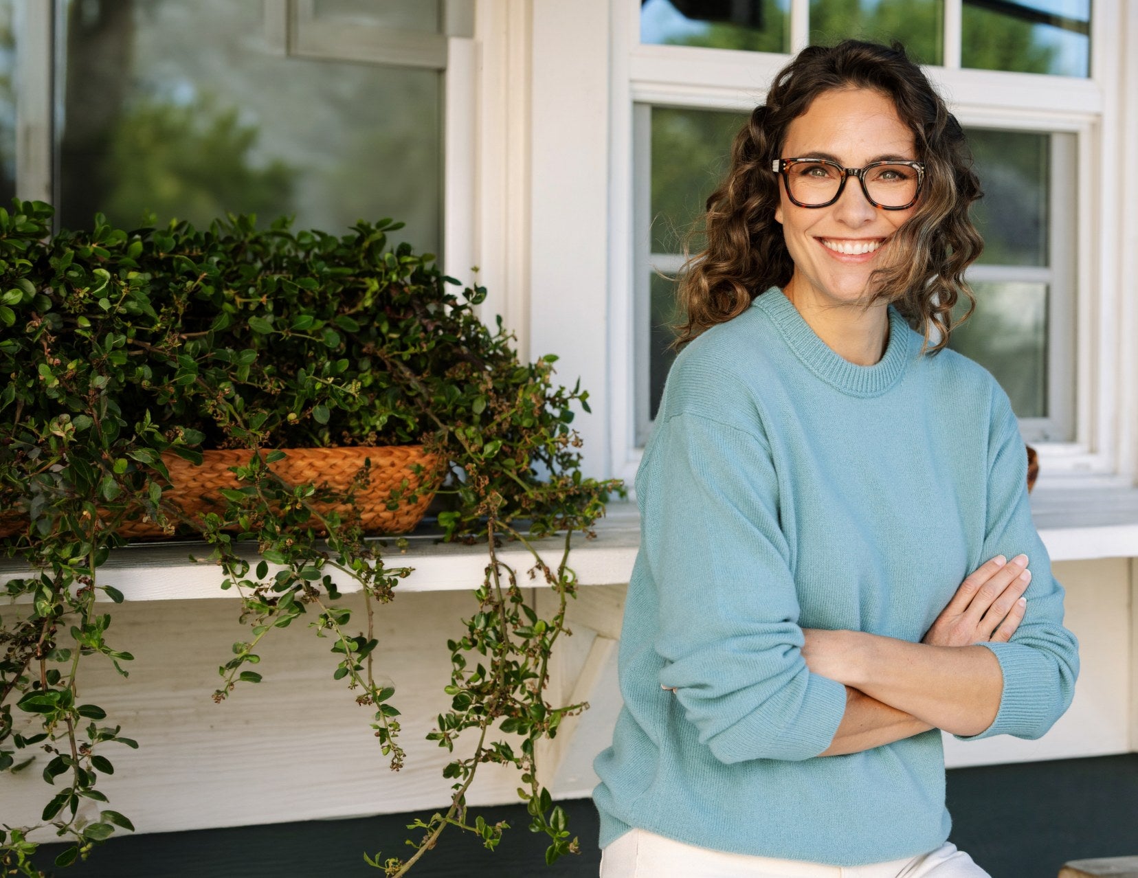 Woman wearing Peepers readers from the FA26 collection